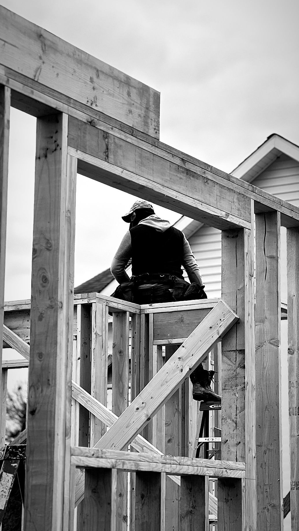 A Cortes crew member on a scaffold — Cortes Building Group on Instagram